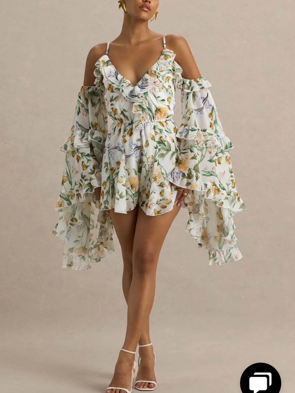 Club L London Lemon Floral Print Chiffon Playsuit with Long Ruffle Sleeves.